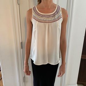 Embroidered neckline in silk tank
